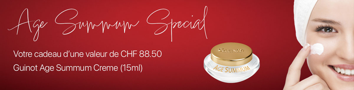 Guinot Age Summum Spécial — femme souriante appliquant une crème, présentant le pot Guinot Age Summum 15 ml offert comme cadeau d’une valeur de CHF 88.50.